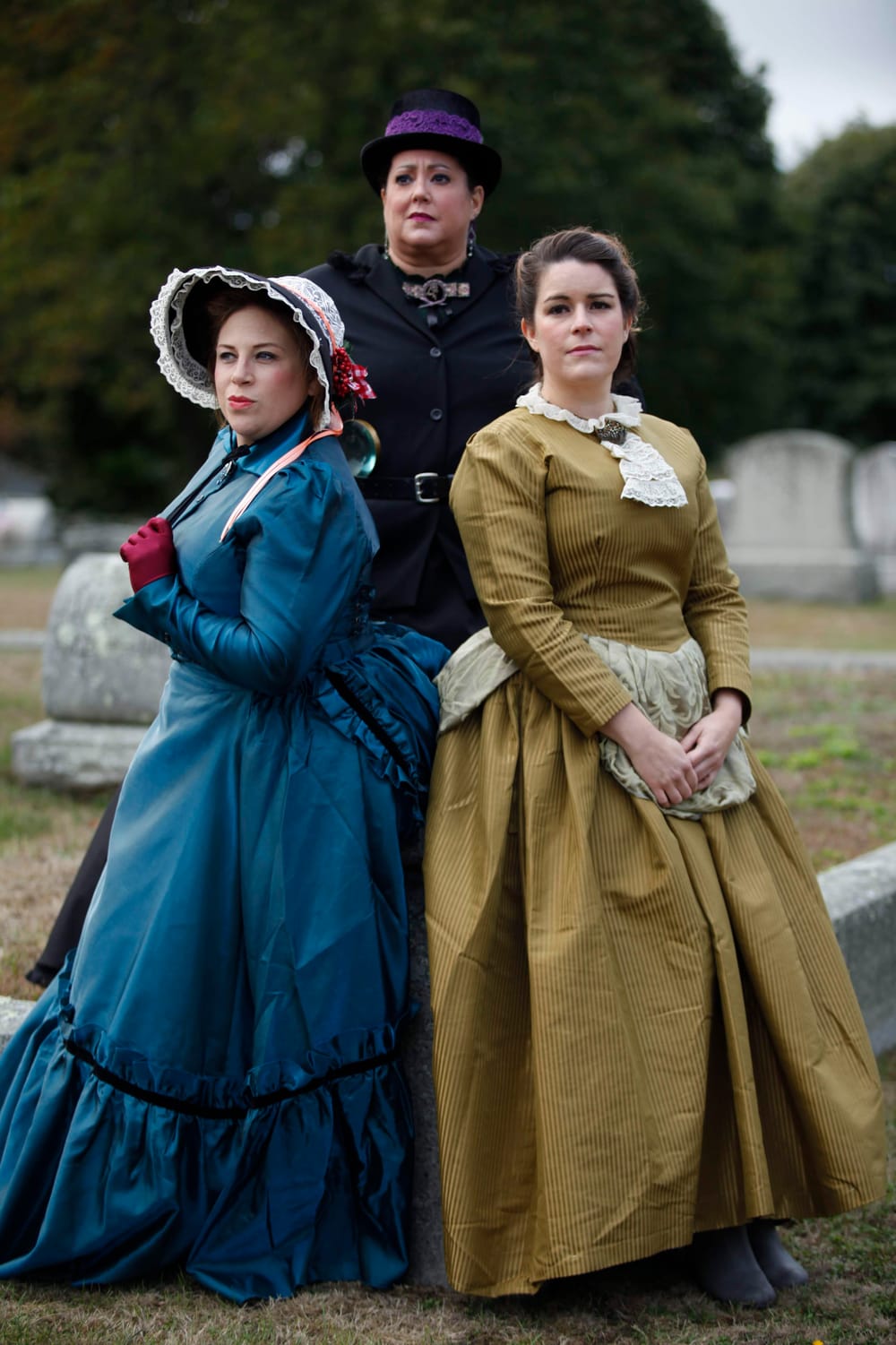 Three women in Victorian dress